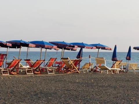 Beach at sunset Stock Photos