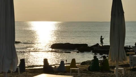 The beach at sunset Stock Photos