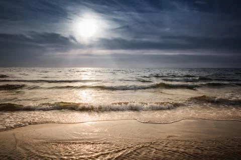 Beach in the sunset Stock Photos