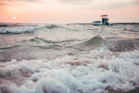 Beach at sunset Stock Photos