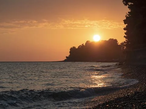 Beach with sunset Fotos Stock