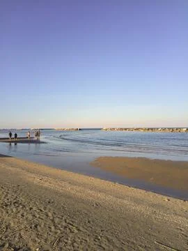 Beach at sunset Stock Photos