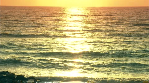 Beach sunset reflected on water Video stock 986856