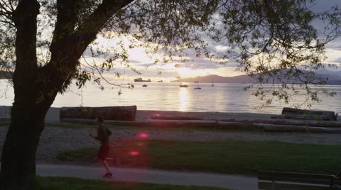 Beach Sunset Sailboats Runner Stock Footage 46970199