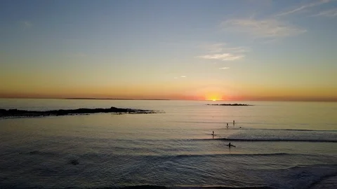 Beach Sunset (Surfers & Table mountain) Cape Town Stock Footage