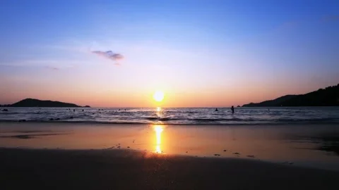 Beach Sunset Time-Lapse – Fast-Moving Clouds and Ocean Horizon at Golden Hour Stock Footage 312775928