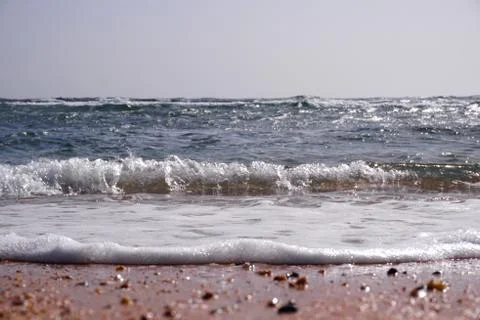 Beach in sunset time, tilt shift soft effect Stock Photos