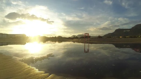 Beach sunset timelapse after being flooded by an strong storm in 4K Video stock 119173720