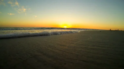 BEACH, SUNSET, WAVES COMING AT CAMERA Stock Footage 37154136