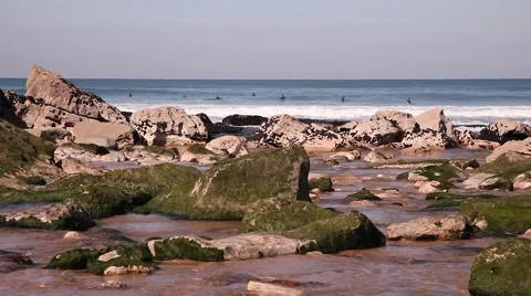 Beach with surfers in water Stock Footage 51109973