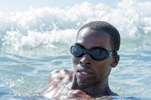 Beach swim Stock Photos