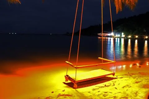 Beach swing at night Stock Photos