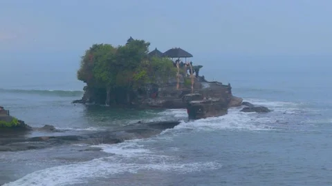 The beach at Tanah Lot which is seen from a different perspective Stock-Footage 225214699