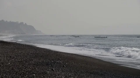 The beach of Taormina with Capo Alì on the bottom Stock Footage 84008410
