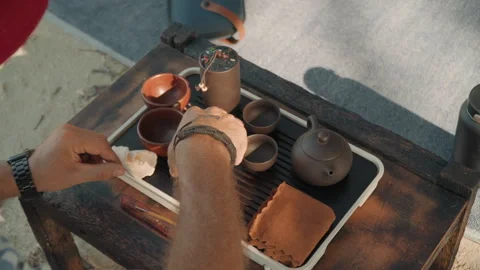 Beach tea service. Seaside tea set arrangement. Casual coastal tea presentation Stock Footage 333567323
