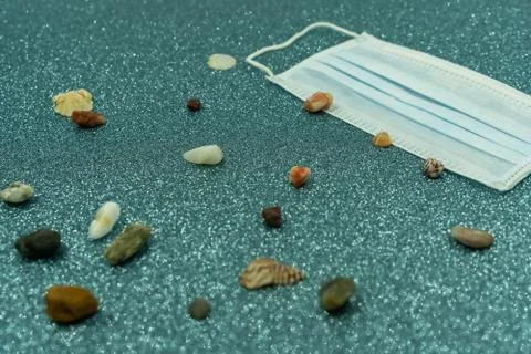 Beach theme with mask, shell and stones. Stock-Fotos