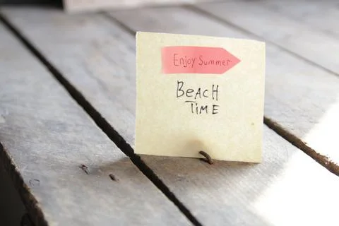 Beach time inscription and pointer. Creative summer concept. Stock Photos