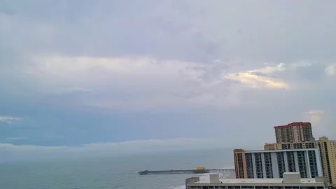 Beach time-lapse Atlantic ocean of heavy cloudy day over the beach with peaks Stock Footage 170574167