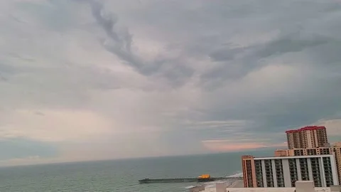Beach time-lapse Atlantic ocean heavy clouds storm coming in. Stock Footage 170574595