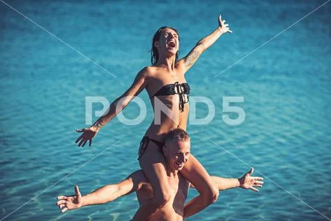 Beach time relax. beach at sea with happu couple in love. Stock Photos