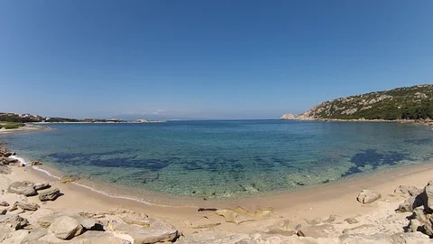 Beach with torquoise beach in a small bay Stock Footage 128707085