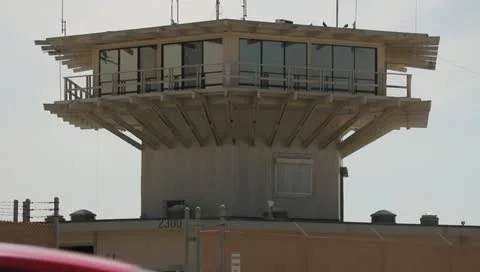 Beach Tower &amp; A Jogger Stock Footage 11360300