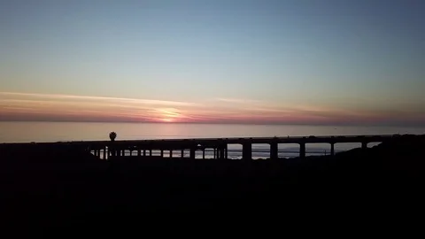 Beach Town Post Sunset Rush Hour on the Bridge - Slide Left Stock Footage 84758198