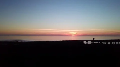 Beach Town Post Sunset Rush Hour traffic crossing a Bridge - Tripod Mount Stock Footage 84758212