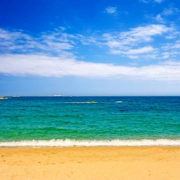 Beach with turquoise water Stock Photos