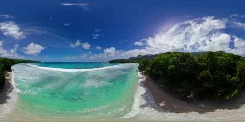 Beach with turquoise waves and lush forest. Mahe, Seychelles. Stock Footage 301286067
