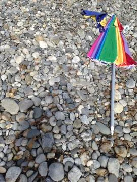 Beach umbrella laying down Stock Photos