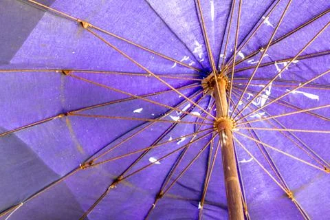 Beach umbrella with rust Stock-Fotos
