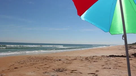 Beach Umbrella on a vacant beach Video stock 44619459