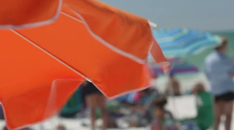 Beach Umbrella in the wind Stock Footage 8686442