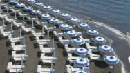 Beach Umbrellas And Chairs On A Mediterranean Beach. Atrani, Italy. Stock Footage