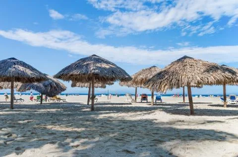 Beach umbrellas on the beach Stock Photos