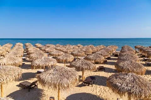 Beach with umbrellas Stock-Fotos
