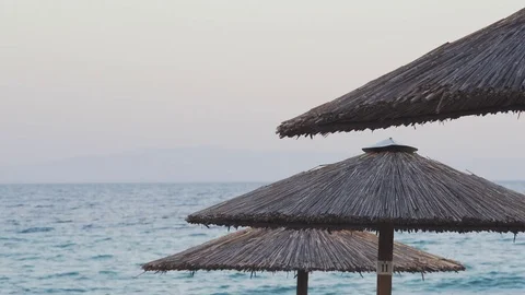 Beach Umbrellas By The Sea 스톡 동영상 80554558