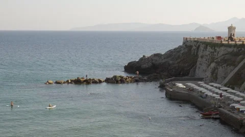 Beach under Bovio square in the antique village of Piombino Stock Footage 314074133
