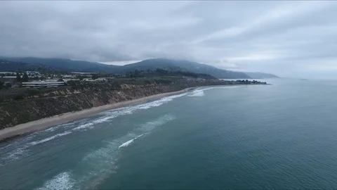 Beach under cliff Stock Footage 98474338