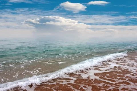 The beach under a sky Stock Photos