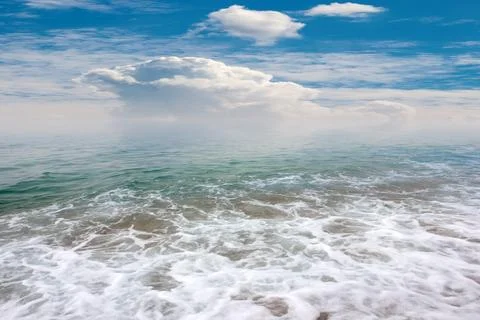 The beach under a sky Stock Photos