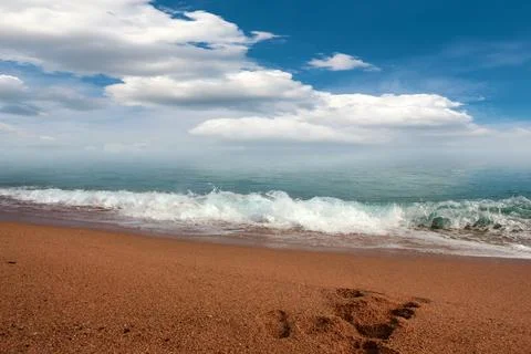 The beach under a sky Stock Photos