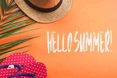Beach vacation. Flat lay on orange. Hello summer Stock Photos