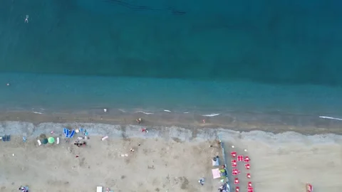 Beach with vacationers, view from a copter. Stock Footage 255849937