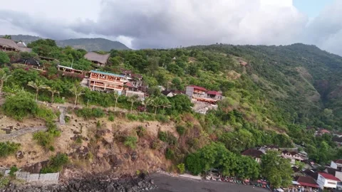 Beach view cafe. Amed beach in Bali. Mount Agung volcano in the background Stock Footage 283956975