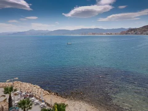 Beach view with clouds and clean water Stock Photos