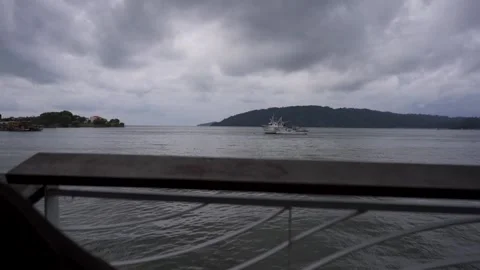 Beach view on a decking with dark sky before raining no color graded - Sabah Stock Footage 136564330