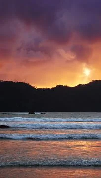Beach view at dusk Stock Photos