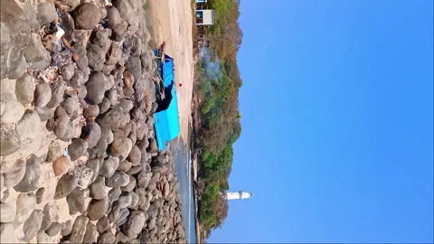 Beach view with lighthouse located in Garut, West Java, Indonesia Stock Footage 295842129